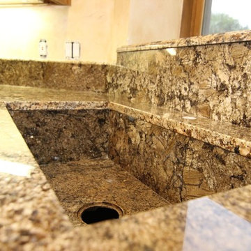 Coliseum kitchen with custom granite sink and Ogee edge