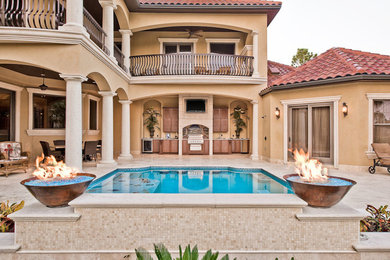 Tuscan exterior home photo in Miami