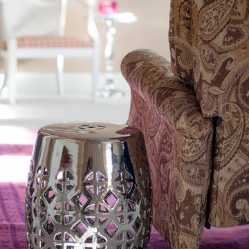 Existing, dark recliner with gleaming metallic