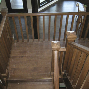 Ash Scandinavian Style Stair with a Walnut Stain and Closed Stringers