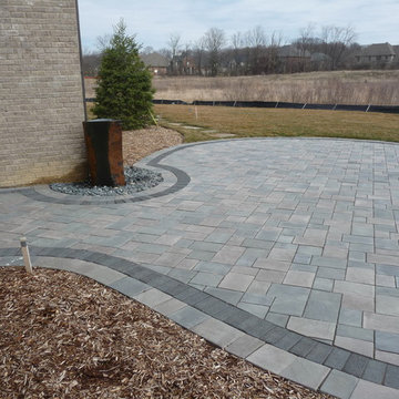 Unilock Richcliff Paver Patio w/ a Seat Wall, Fire Pit & Light Post
