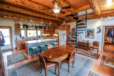 Example of a mountain style home design design in Denver