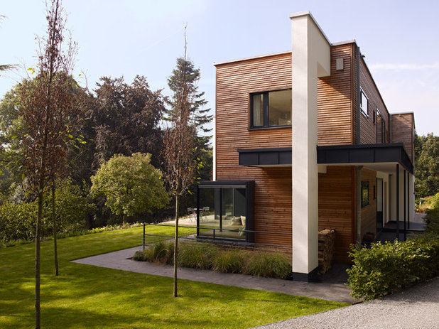 Современный Фасад дома by Bau-Fritz GmbH & Co. KG