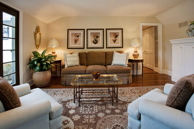 Living room - mid-sized traditional dark wood floor and brown floor living room idea in New York with beige walls