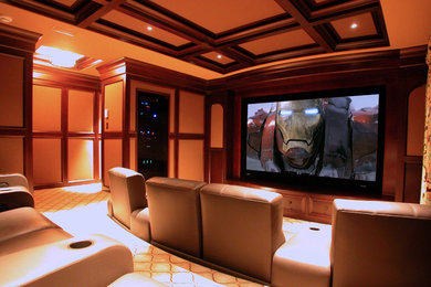 Large transitional enclosed home theatre in Other with a projector screen, beige walls, carpet and beige floor.