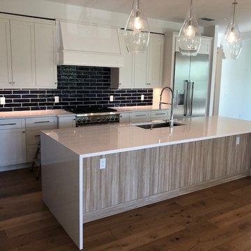 New Age Kitchen with Quartz Countertop with Waterfall Legs
