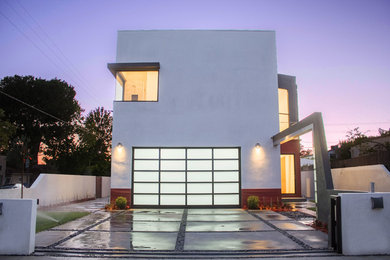 Inspiration for a mid-sized modern white two-story stucco exterior home remodel in Los Angeles