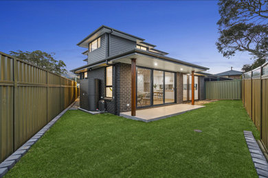 Photo of a modern home design in Wollongong.