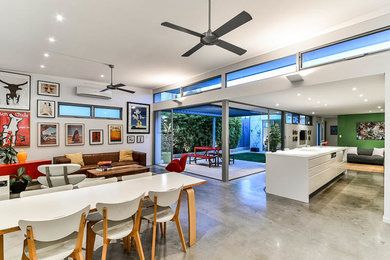 Design ideas for a mid-sized modern home design in Perth.