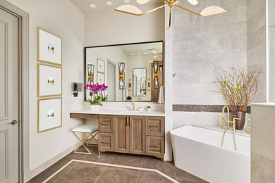 Bathroom - large master bathroom idea in Dallas with flat-panel cabinets, medium tone wood cabinets, quartzite countertops and a built-in vanity