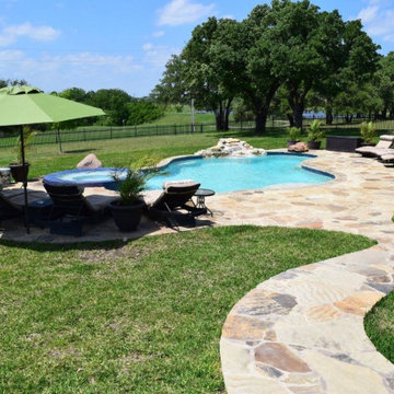 Freeform Pool with Overflow Spa and Rock Waterfall
