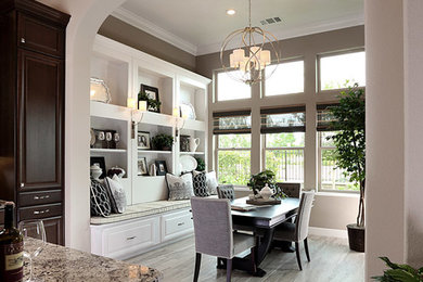 Inspiration for a large transitional kitchen/dining room combo remodel in Sacramento with gray walls and no fireplace