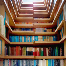 stairway with books behind. interesting idea.