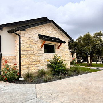 Black seamless gutter installation - Custom home in Georgetown, Texas