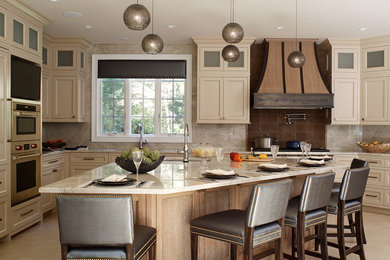 Inspiration for a large transitional u-shaped porcelain tile and beige floor eat-in kitchen remodel in New York with an undermount sink, recessed-panel cabinets, beige cabinets, quartzite countertops, beige backsplash, glass tile backsplash, paneled appliances and an island