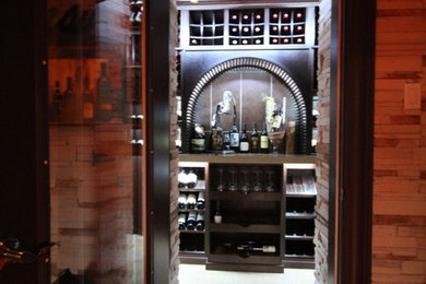 Inspiration for a contemporary wine cellar remodel in Ottawa