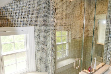 Mid-sized minimalist master multicolored tile and mosaic tile ceramic tile corner shower photo in Philadelphia with flat-panel cabinets, gray cabinets, a one-piece toilet, multicolored walls, a trough sink and quartz countertops