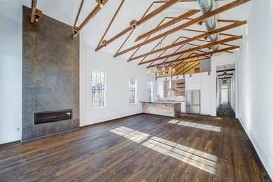 Huge transitional open concept family room photo in New Orleans