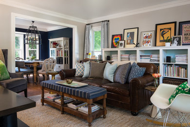 Inspiration for a timeless living room library remodel in Detroit with gray walls