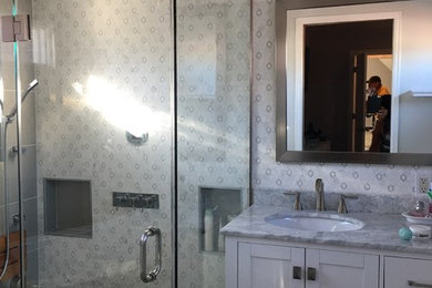 Example of a transitional bathroom design in Denver