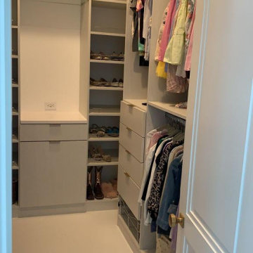 Efficient Organization: Small Gray Walk-in Closet Solutions