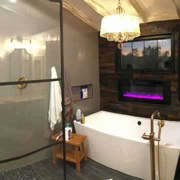 Freestanding Tub with Fireplace and Chandelier