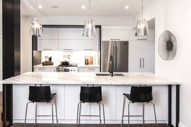Example of a minimalist kitchen design in Toronto