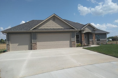 Inspiration for a timeless one-story exterior home remodel in Other