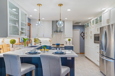Kitchen pantry - mid-sized eclectic u-shaped vinyl floor and blue floor kitchen pantry idea in San Francisco with a single-bowl sink, shaker cabinets, white cabinets, quartz countertops, blue backsplash, glass tile backsplash, stainless steel appliances, a peninsula and white countertops