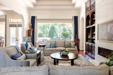 Inspiration for a transitional family room remodel in Houston