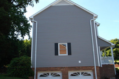 Inspiration for a farmhouse exterior home remodel in Other