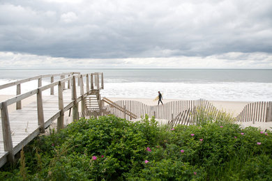 Photo of a coastal backyard landscaping in New York with decking.