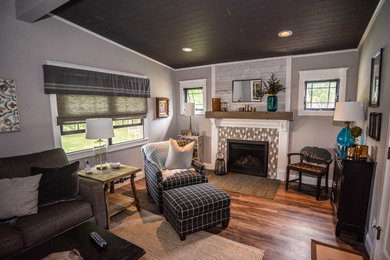 Mid-sized transitional enclosed family room photo in New York with gray walls