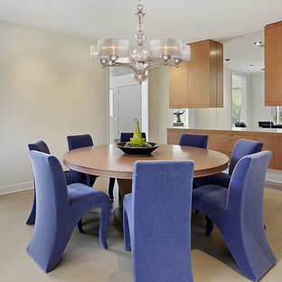 Design ideas for an expansive tropical open plan dining in New York with beige walls, medium hardwood floors, a standard fireplace and a stone fireplace surround.