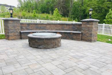 Design ideas for a mid-sized backyard patio in Baltimore with concrete pavers.