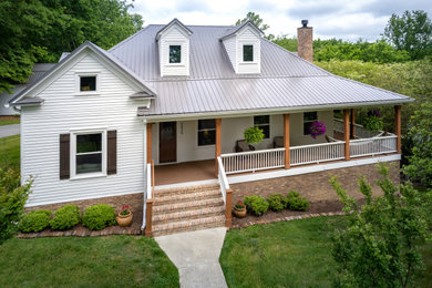 Inspiration for a farmhouse home design remodel in Other