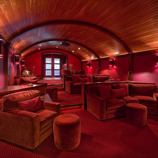 Home theater - large contemporary enclosed carpeted and red floor home theater idea in Detroit with red walls and a projector screen