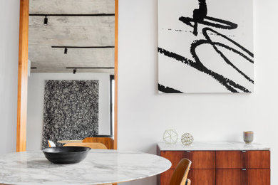 Urban dining room photo in Miami