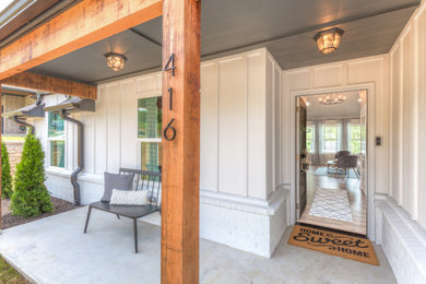 Cottage front porch photo in Other