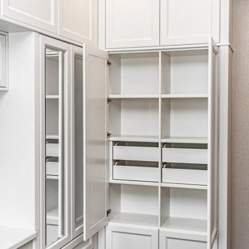 Elegant White Custom Closet with Paneled Doors