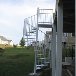 s056 Spiral Staircase with custom landing from Deck to patio in Williamsburg, Va - Products