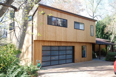 Mid-sized trendy two-story wood house exterior photo in Dallas with a shed roof and a shingle roof