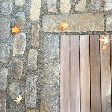 Reclaimed granite cobble and ipe decking detail
