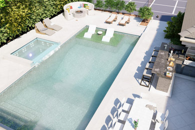 Modelo de piscina moderna rectangular en patio trasero con adoquines de hormigón