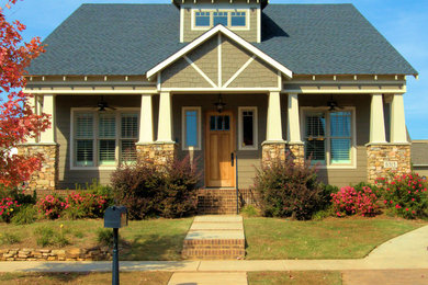 Traditional beige one-story exterior home idea in Other
