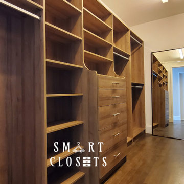 Master Walk In and Wall Unit Closet in Esterel Finish Designed by Smart Closets