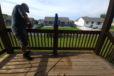 Mid-sized backyard second story wood railing deck photo in Wichita