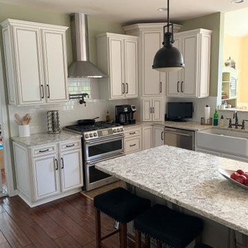 cabinet refacing ant white with brown glaze--quartz and new backsplash