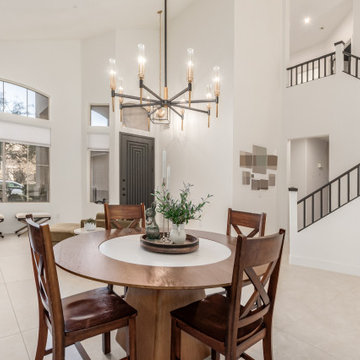 Scottsdale, AZ Dining Room with Statement Chandelier and Grand Entryway