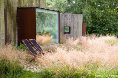 Cette image montre un jardin nordique avec une exposition ensoleillée.